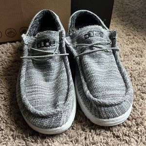 Never worn size 11 Hey Dude comfortable type of shoe with granite as the color